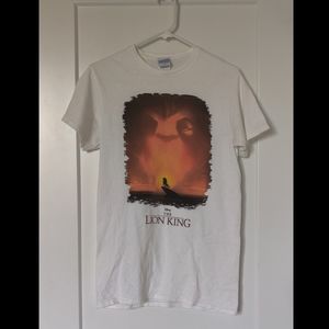 A white tee shirt with a Lion King print.